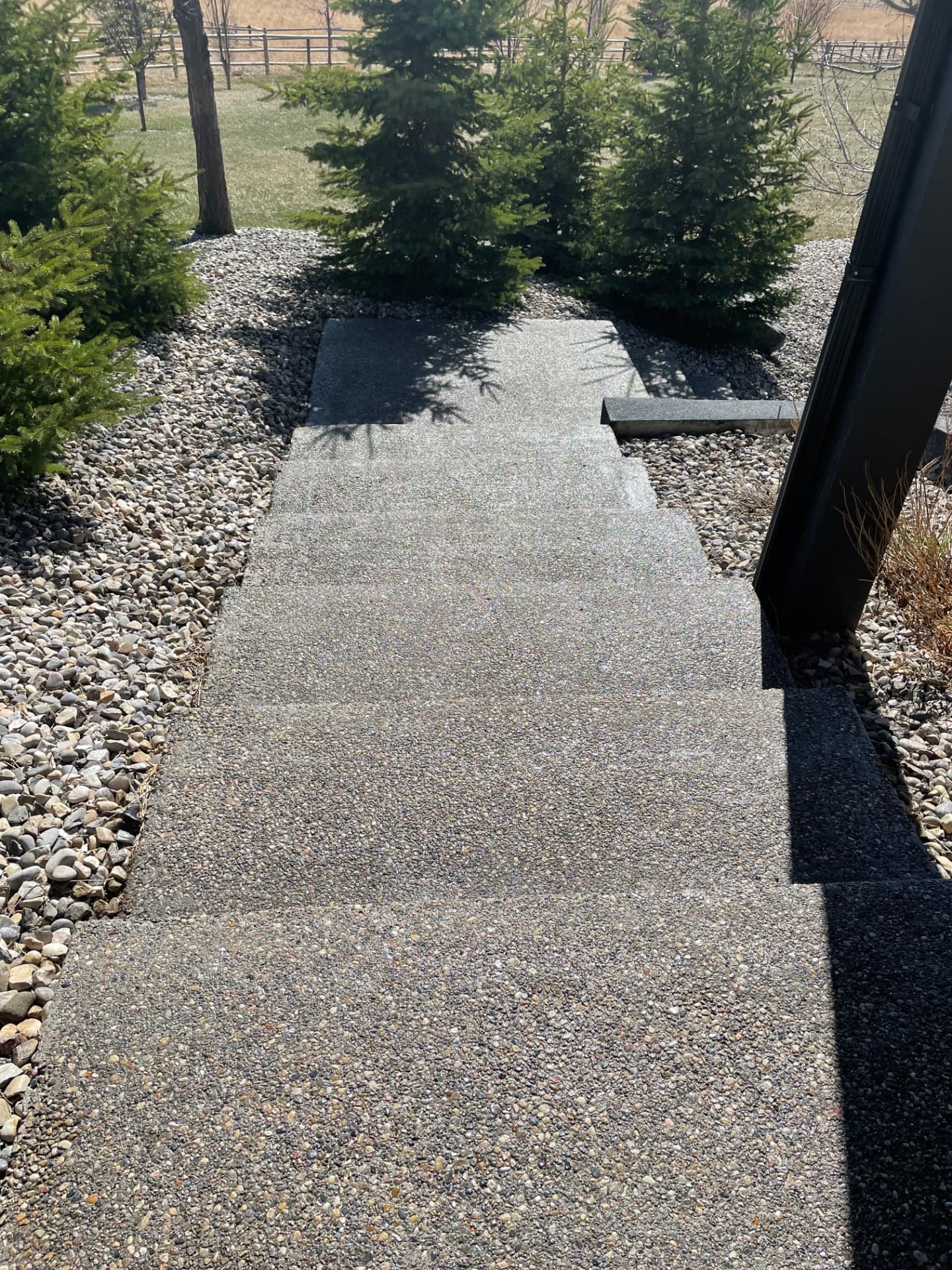 Exposed aggregate walkway before cleaning and sealing